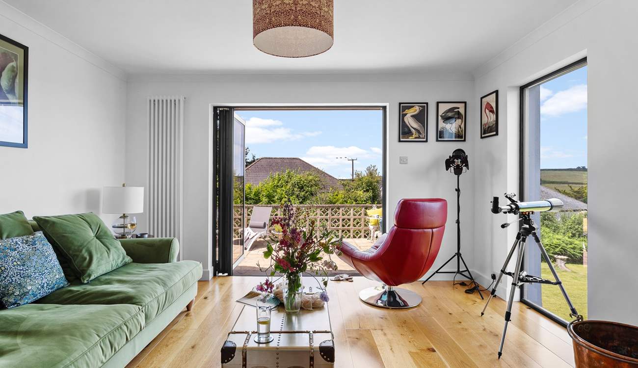 Take in the views with the telescope. 