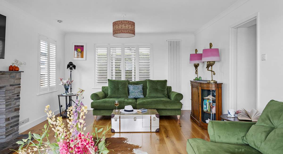 Contemporary furnishings await in the spacious sitting-room. 