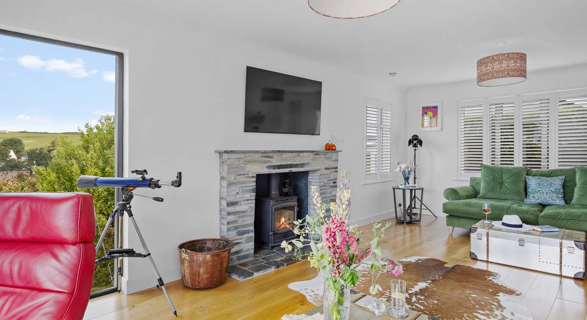 The wood-burner will keep you cosy on cooler days. 