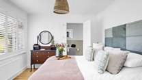 Bedroom 1 is beautifully furnished with a super-king size bed.