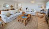 The sitting-room is an oasis of calm, neutral tones.  - Thumbnail Image