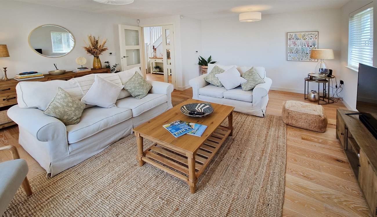 The sitting-room is an oasis of calm, neutral tones. 