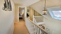 The bedrooms are on the first floor. 
