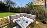 Enjoy the garden in the Devonshire sunshine whilst the children and family dog play on the lawn.  - Thumbnail Image