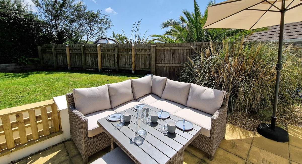 Enjoy the garden in the Devonshire sunshine whilst the children and family dog play on the lawn. 