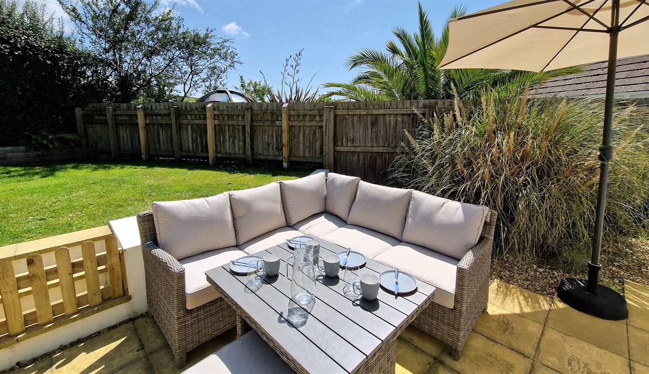 Enjoy the garden in the Devonshire sunshine whilst the children and family dog play on the lawn. 