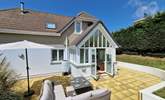 The patio is in a lovely sheltered spot.  - Thumbnail Image
