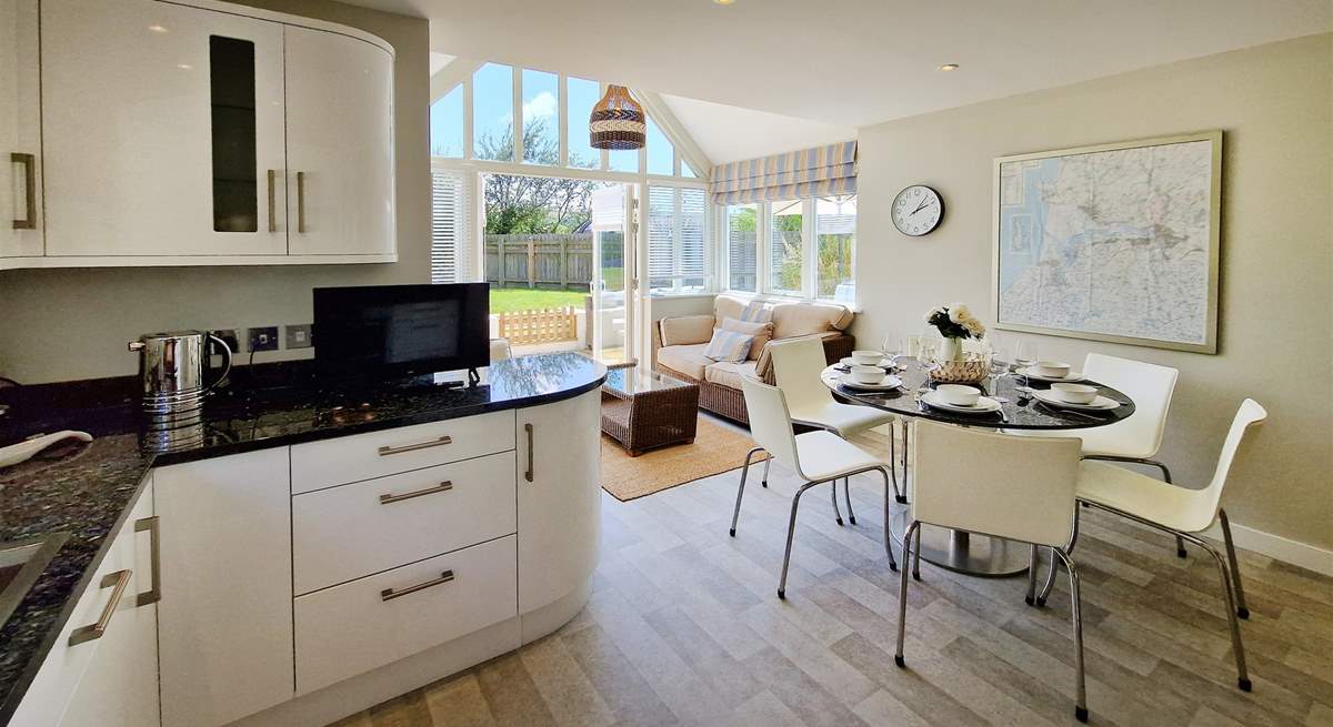 The fabulous kitchen/diner has doors French leading to the garden. 