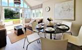 Gather around the dining table for a holiday meal to remember.  - Thumbnail Image