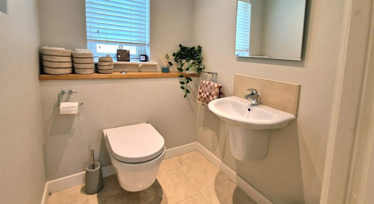The handy ground floor cloakroom. 
