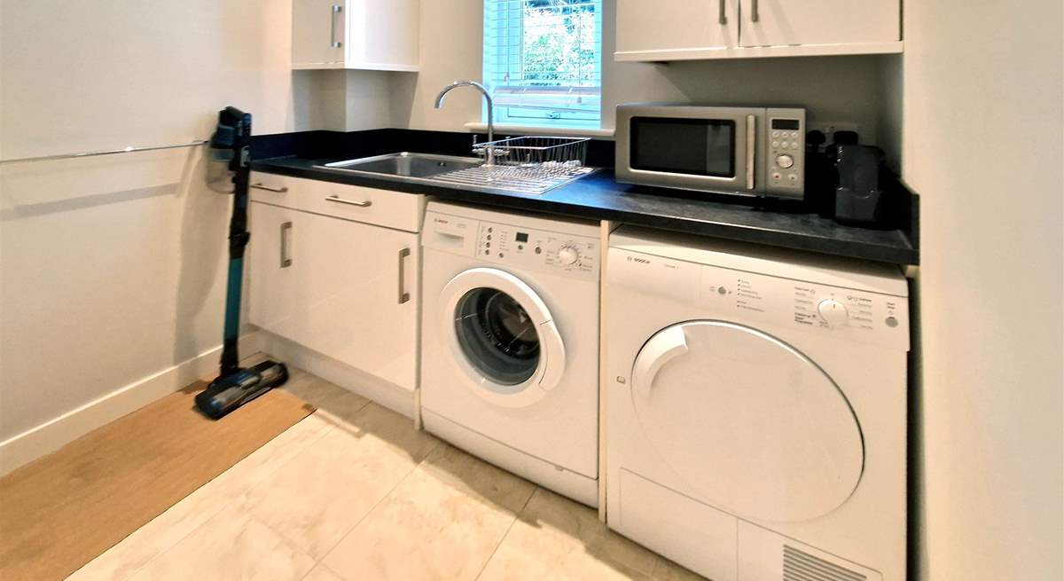 No need to take your dirty laundry home with these facilities in the utility room.