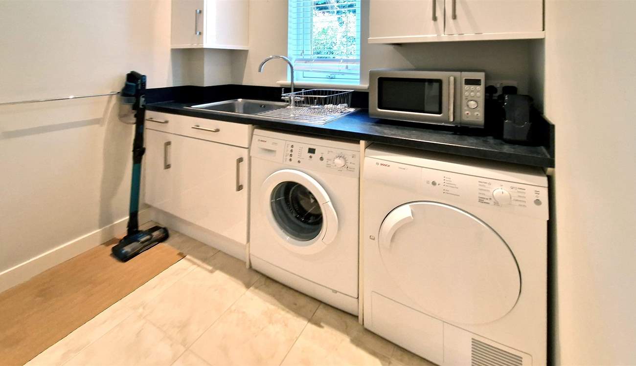 No need to take your dirty laundry home with these facilities in the utility room.