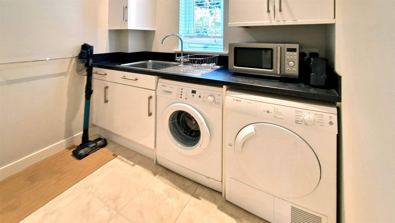 No need to take your dirty laundry home with these facilities in the utility room.