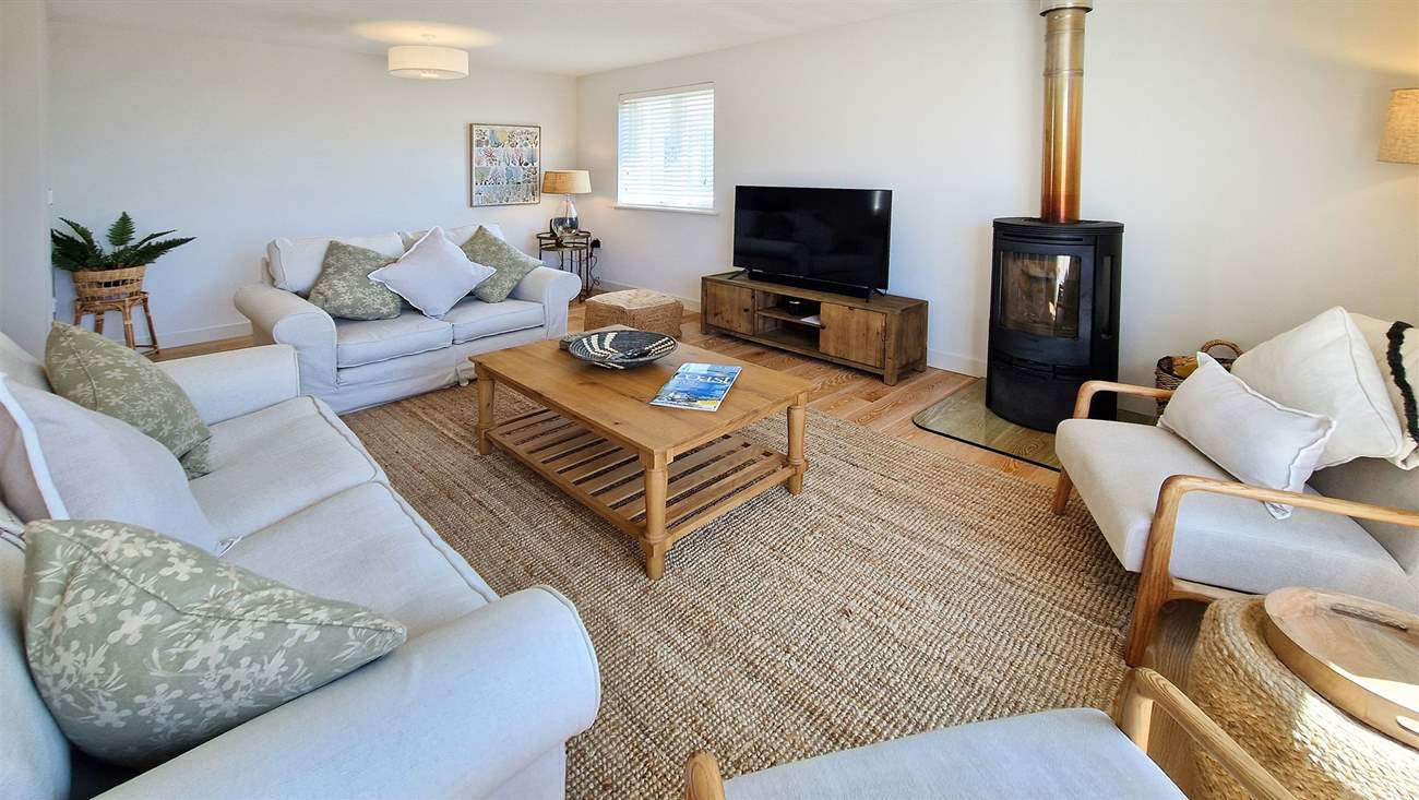 Beautifully furnished throughout, this is the cosy sitting-room.