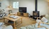 Beautifully furnished throughout, this is the cosy sitting-room. - Thumbnail Image