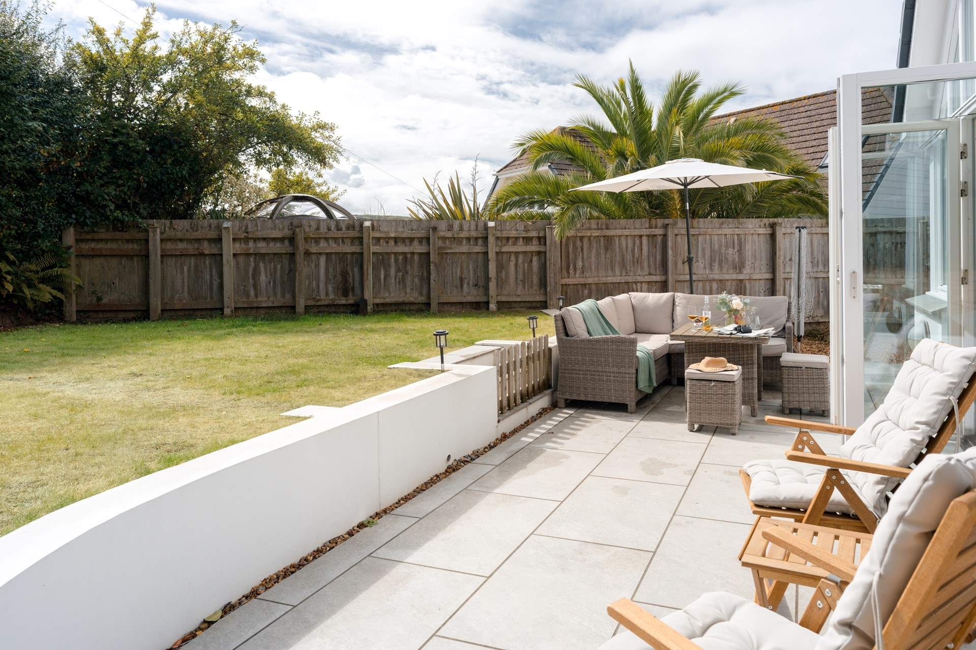 Enjoy the garden in the Devonshire sunshine whilst the children and family dog play on the lawn. 