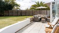 Enjoy the garden in the Devonshire sunshine whilst the children and family dog play on the lawn. 