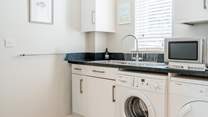 No need to take your dirty laundry home with all these facilities in the utility-room.