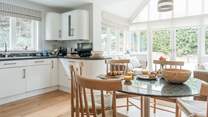 The fabulous kitchen/diner has French doors leading to the garden.  