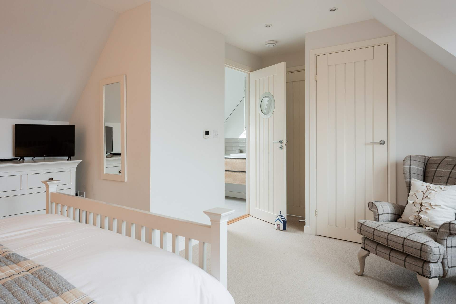 This beautiful room also has a en suite shower-room.