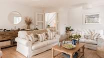 The sitting-room is an oasis of calm, neutral tones. 