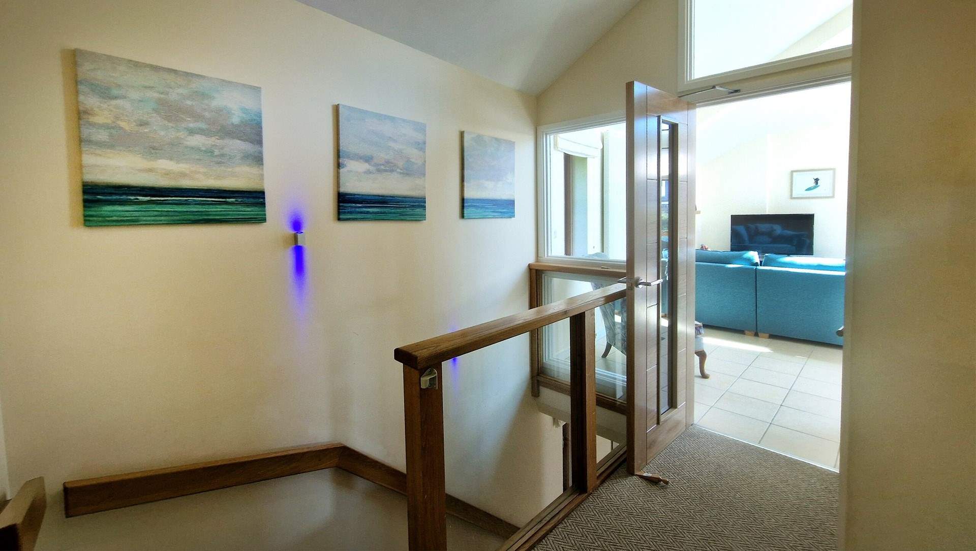 Stairs lead to the living space on the first floor. 