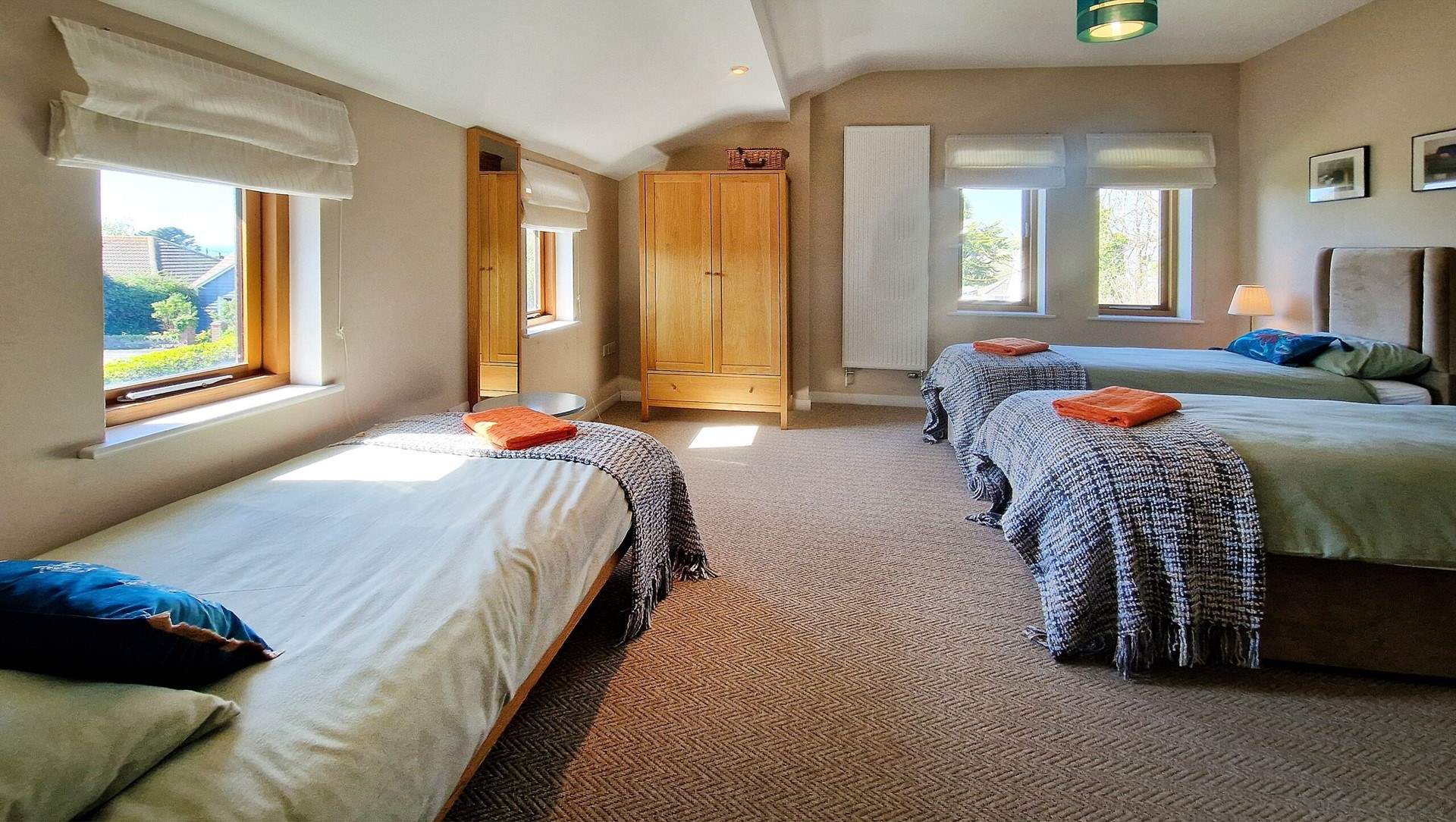 Bedroom two is spacious and has multiple windows for lots of natural light. 