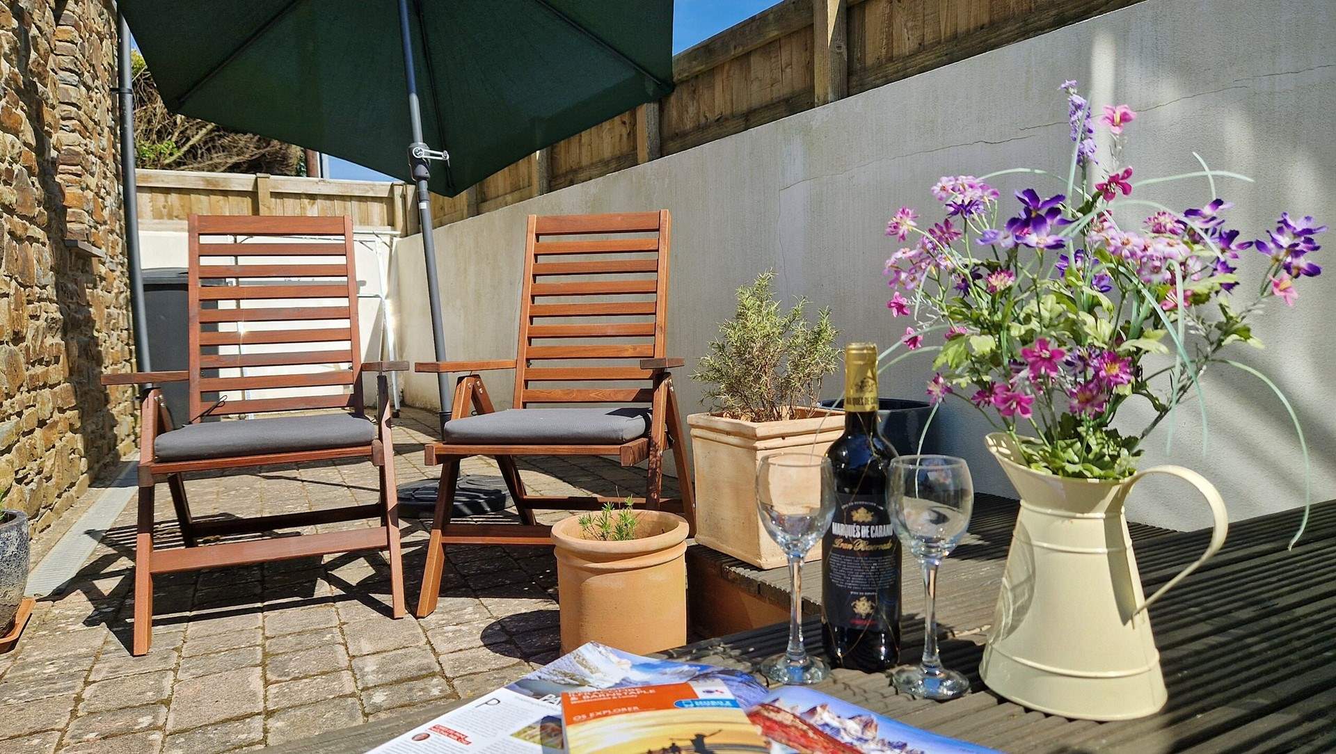The south-facing terrace is perfect for alfresco dining. 
