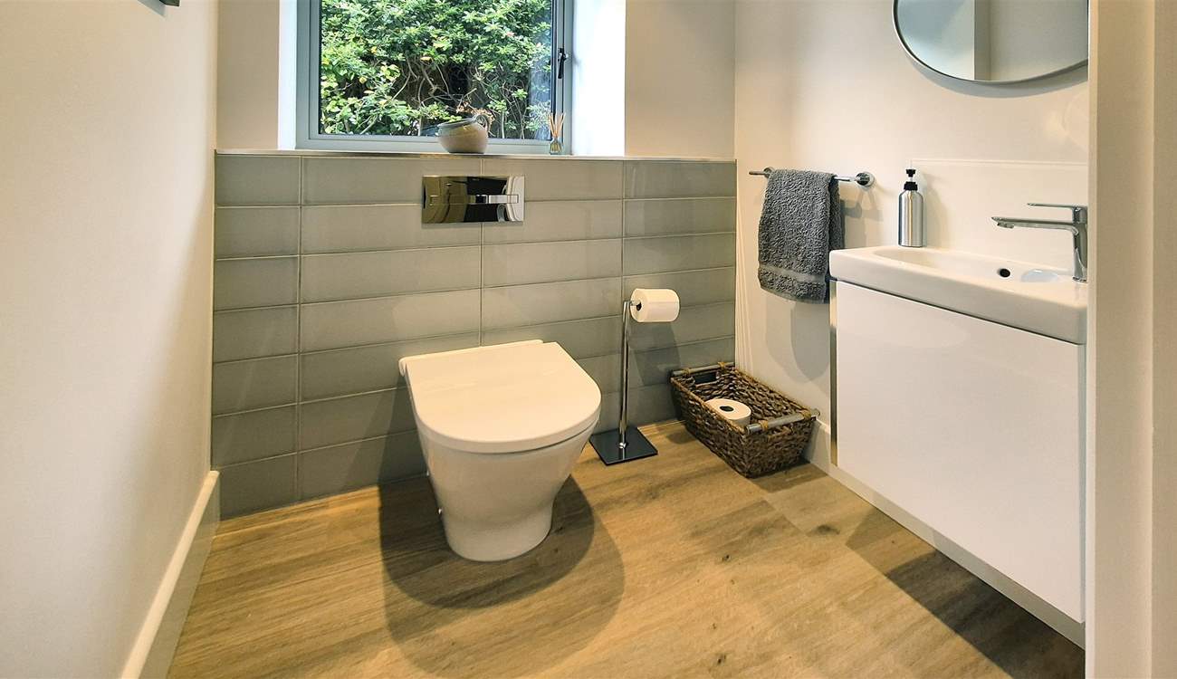 The ground floor cloakroom is accessed through the utility-room.