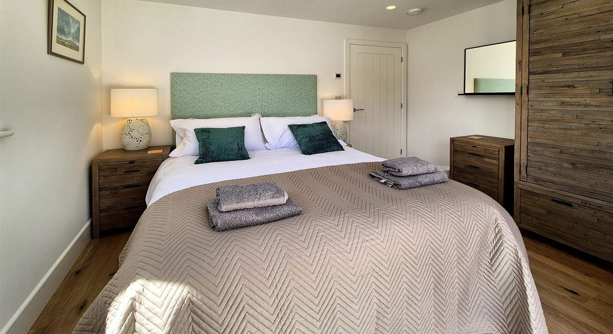 Bedroom two is a stylish king room.