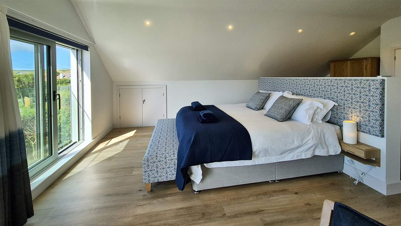Bedroom three is a spacious room with a super king bed.