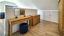 The dressing area has plenty of space for your holiday wardrobe.