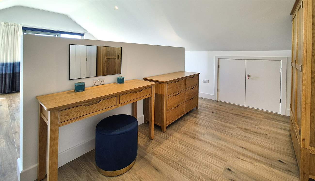 The dressing area has plenty of space for your holiday wardrobe.