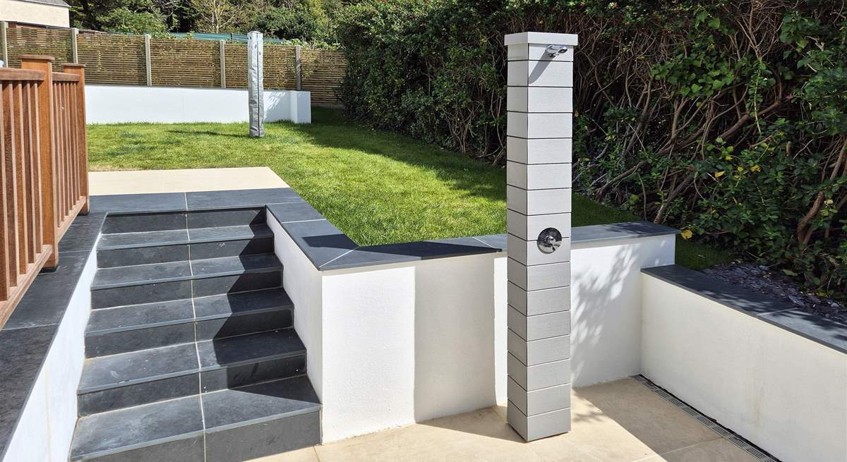 The steps lead up to the lawn.