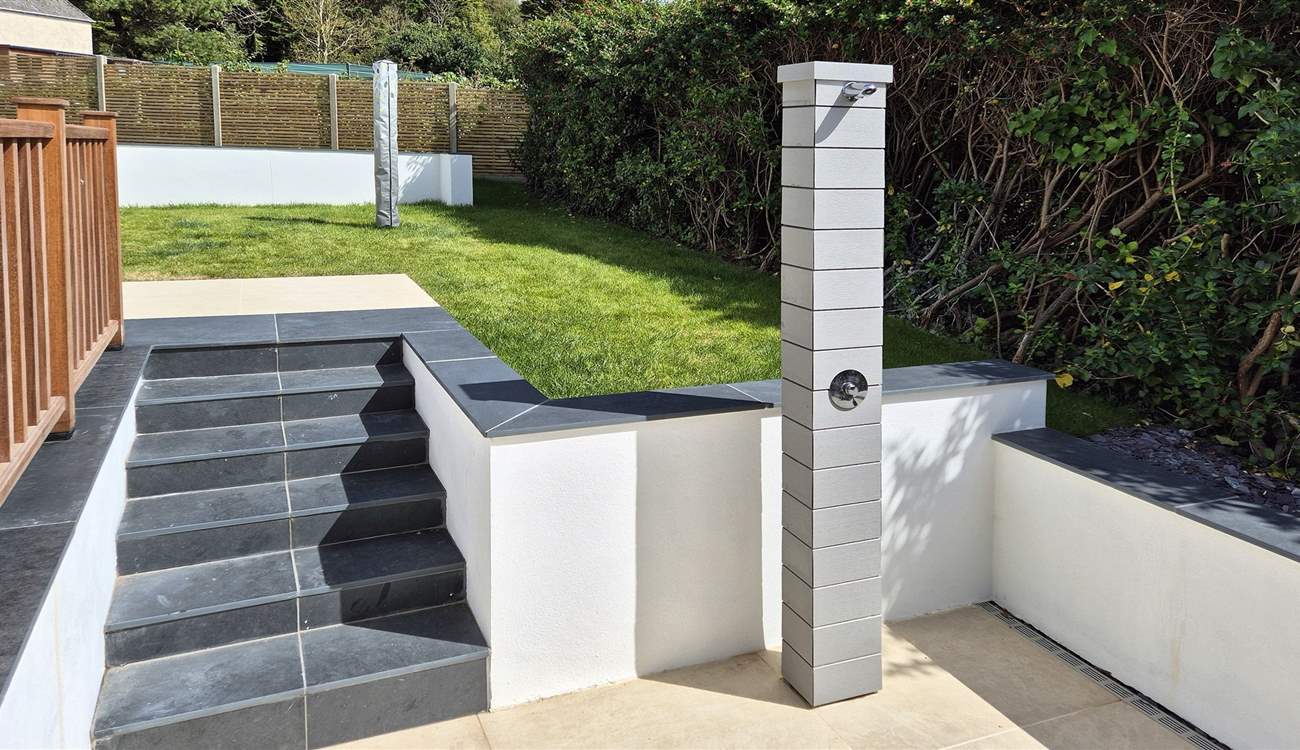 The steps lead up to the lawn.