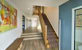 Head upstairs to find bedroom three and four. - Thumbnail Image