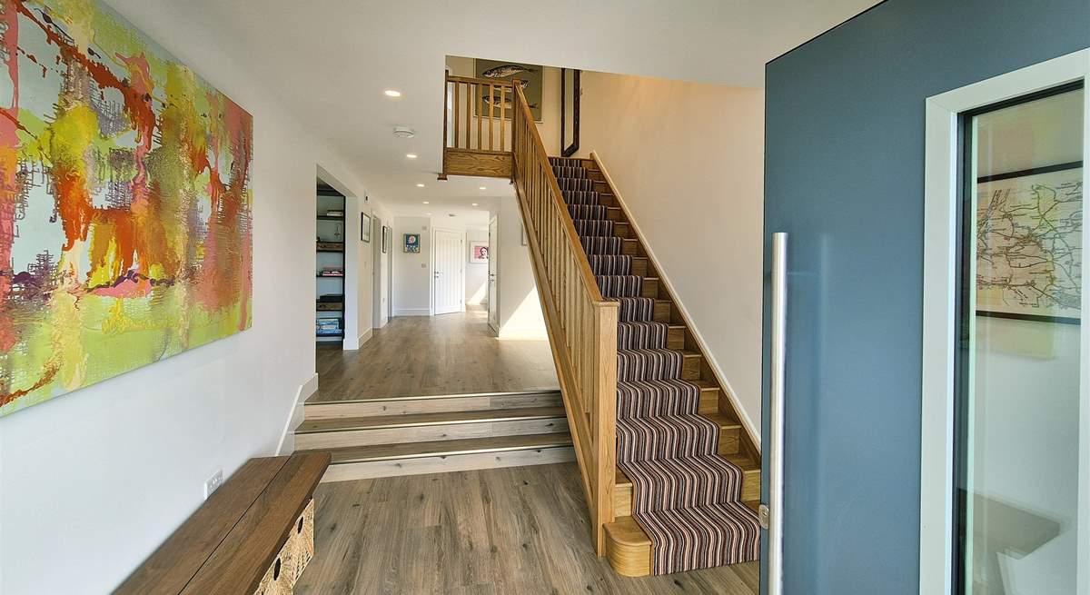 Head upstairs to find bedroom three and four.