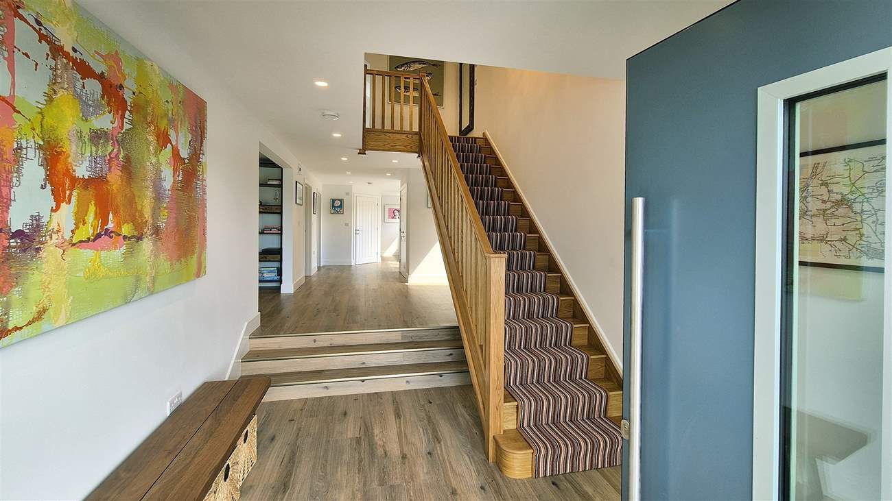 Head upstairs to find bedroom three and four.