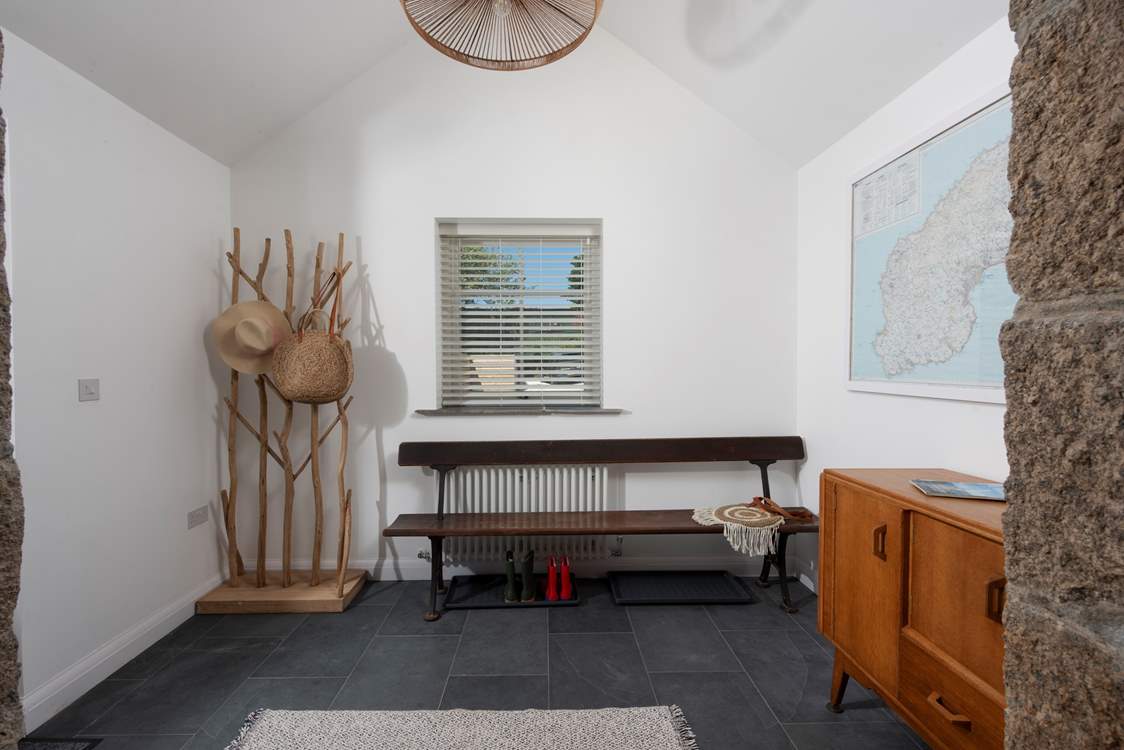 A warm welcome awaits, here is the entrance hall with plenty of space to kick off those sandy shoes.