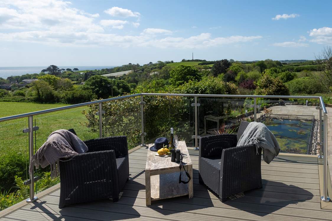 Share a glass of wine and admire the far reaching views.