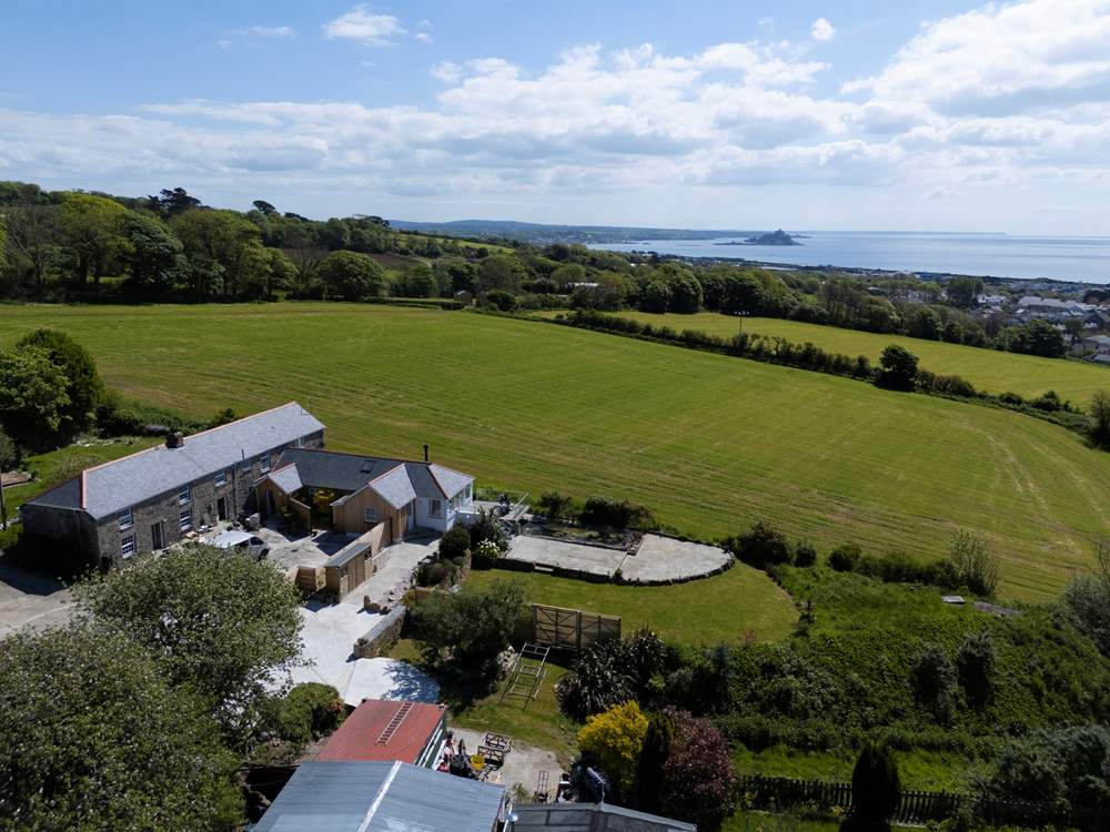 An aerial view of this exceptional location showing St Michael's Mount in the distance.