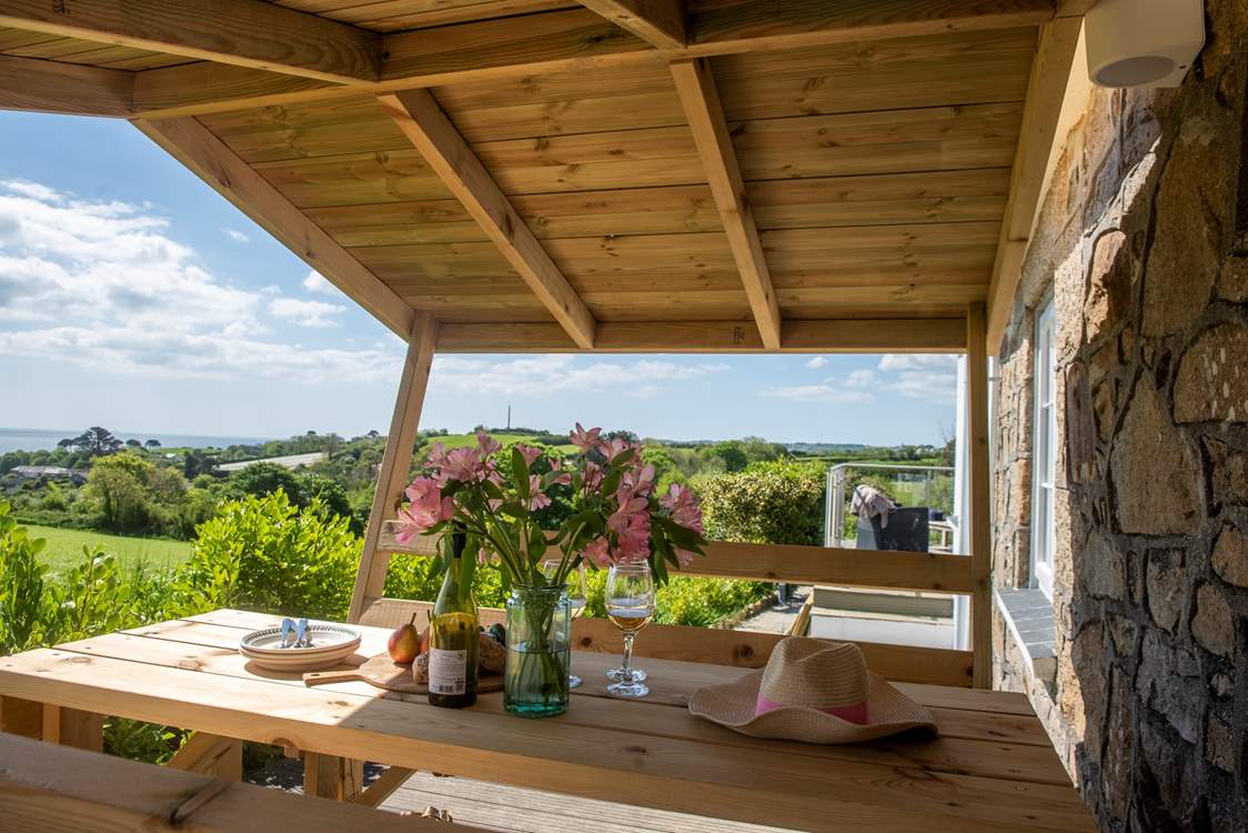 Enjoy a barbecue in the covered sheltered pergola.