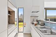 The sleek modern kitchen.
