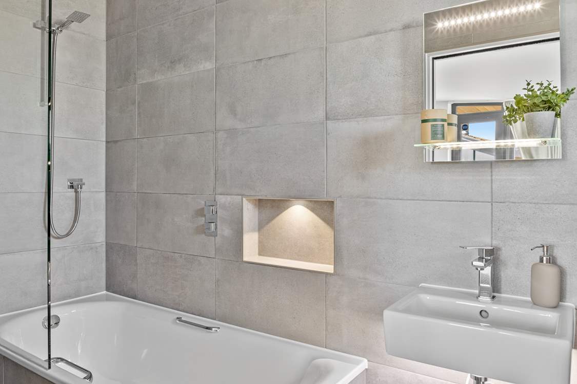 Indulge in a relaxing bath or a refreshing shower.