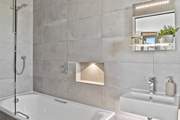 Indulge in a relaxing bath or a refreshing shower.