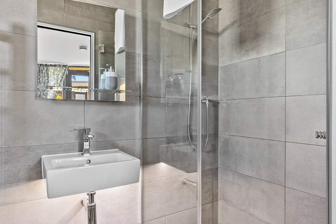 Wash away those sandy toes in the en suite shower-room to bedroom 2.