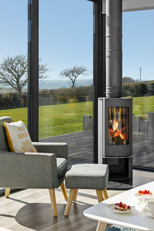 Cosy up around the wood-burner on those chillier days.