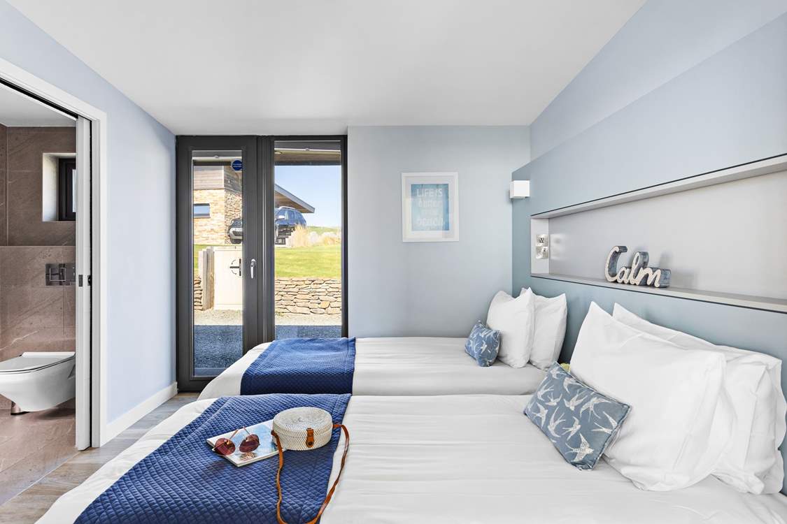 Bright and beautiful - the perfect bedroom for young or old to rest and recharge.