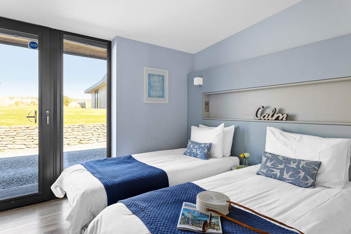 Bedroom two makes the perfect twin with an en suite shower-room.