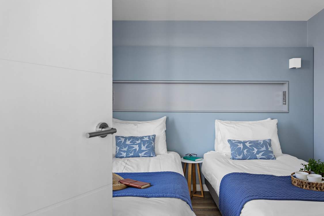 Bedroom 3 sits off of the sitting-room area and can either be made up as a twin or super-king. This room also has an en suite shower-room.